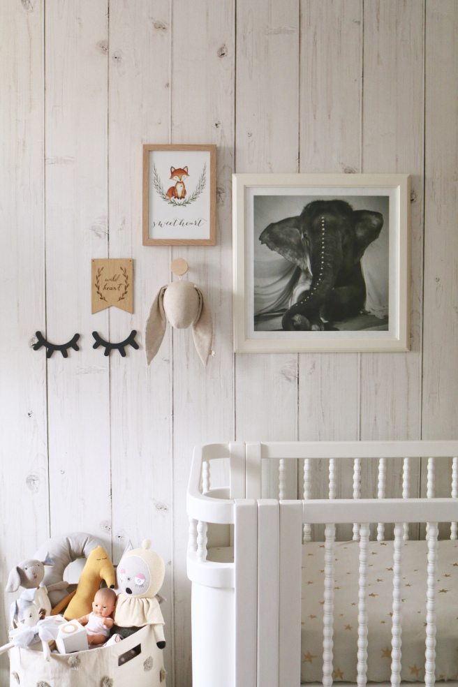 feature wall in a nursery featuring Whitewashed Timber Wallpaper from Milton & King