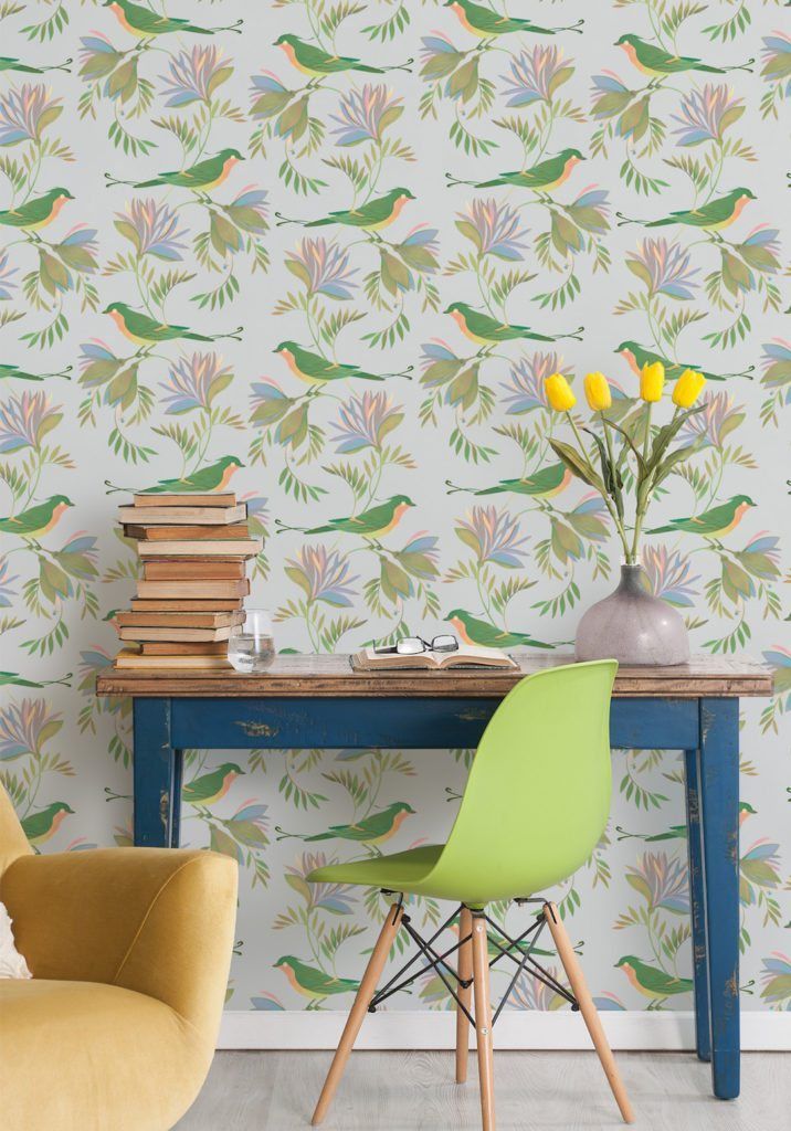 Wallpaper designed by Maria Khersonets manufactured and sold by Milton & King called Winsome showing birds nestling in gorgeous flowers and delicate leaves