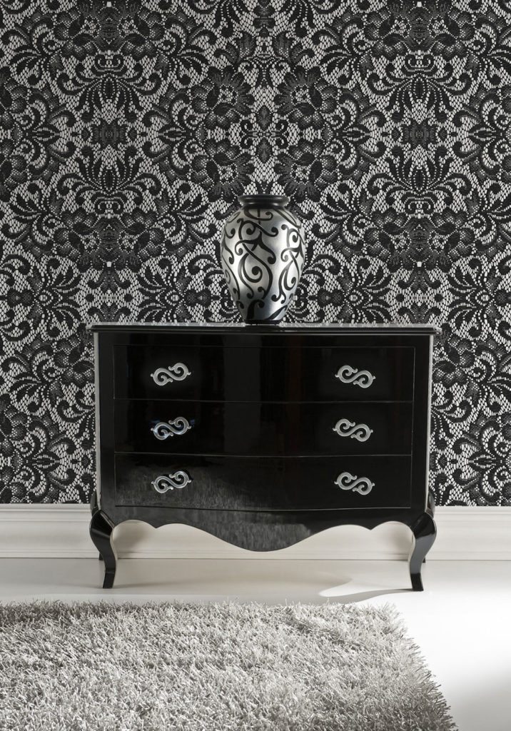 Huntington Lace Wallpaper. White floors and black lace wallpaper with a short black dresser 