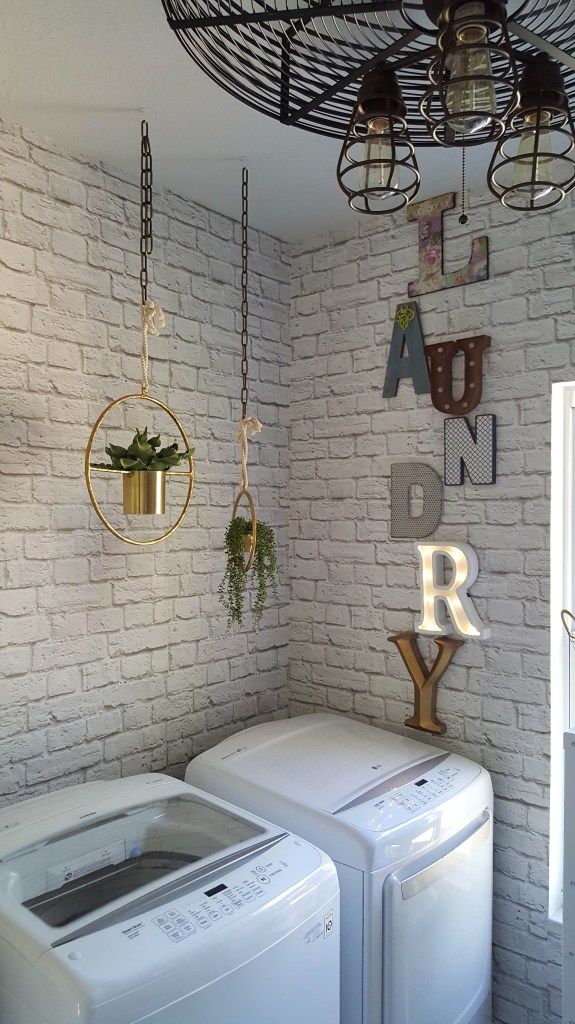 Laundry room with faux brick wallpaper called Soft White Bricks from Milton & King