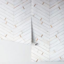 Distressed timber chevron is a white timber chevron wallpaper