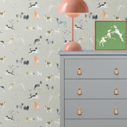 Doggies Wallpaper • Dog Wallpaper • Beige • Insitu with dresser and lamp