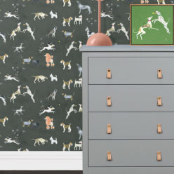 Doggies Wallpaper • Dog Wallpaper • Charcoal • Insitu with grey dresser and salmon lamp