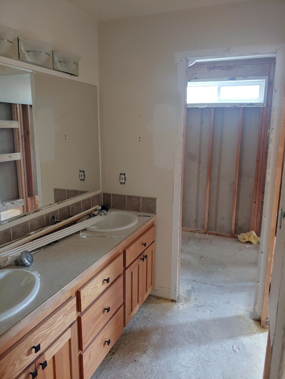 Bathroom before renovation and wallpaper by Lucy Wilkening