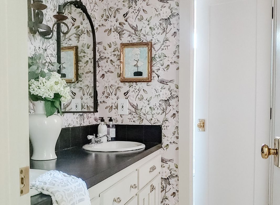 Black and White Bathroom Design with Floral Wallpaper