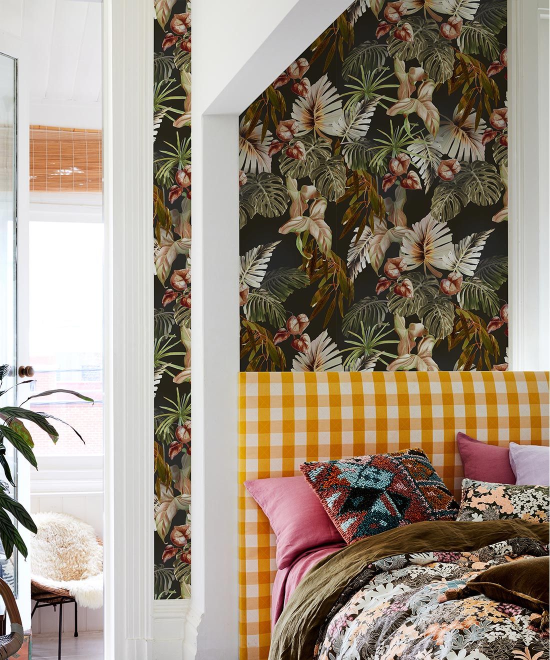 Night Jungle Wallpaper • Kip&co • Leafy Tropical Wallpaper • Insitu with Yellow Plaid Headboard