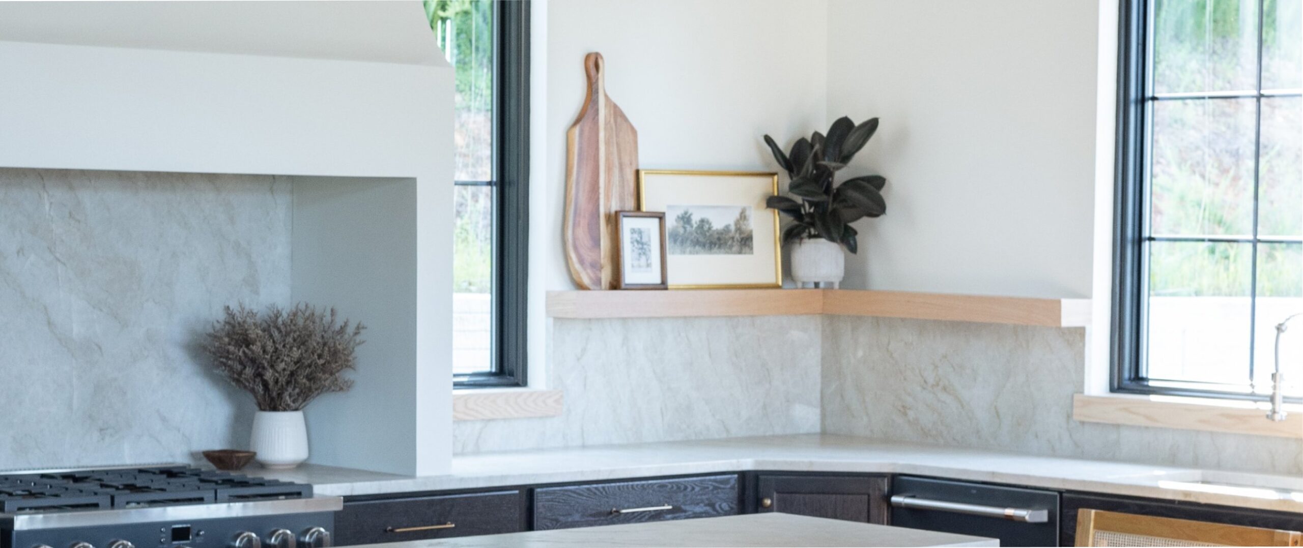 modern expensive kitchen with marble backsplash and counter