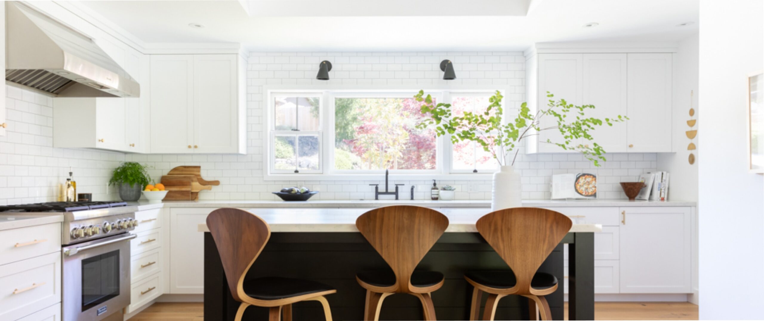 a modern white kitchen by Emily Jonas Design