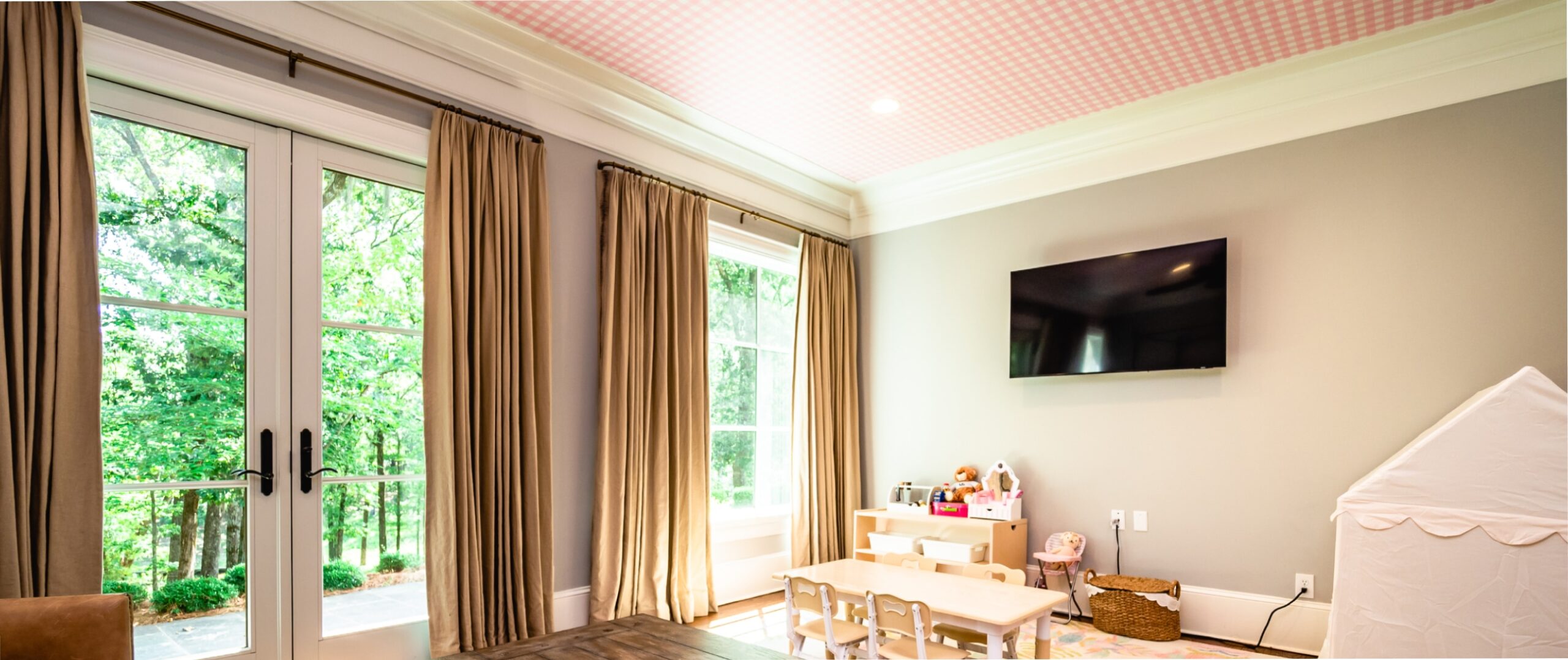 a bright playroom with beige walls