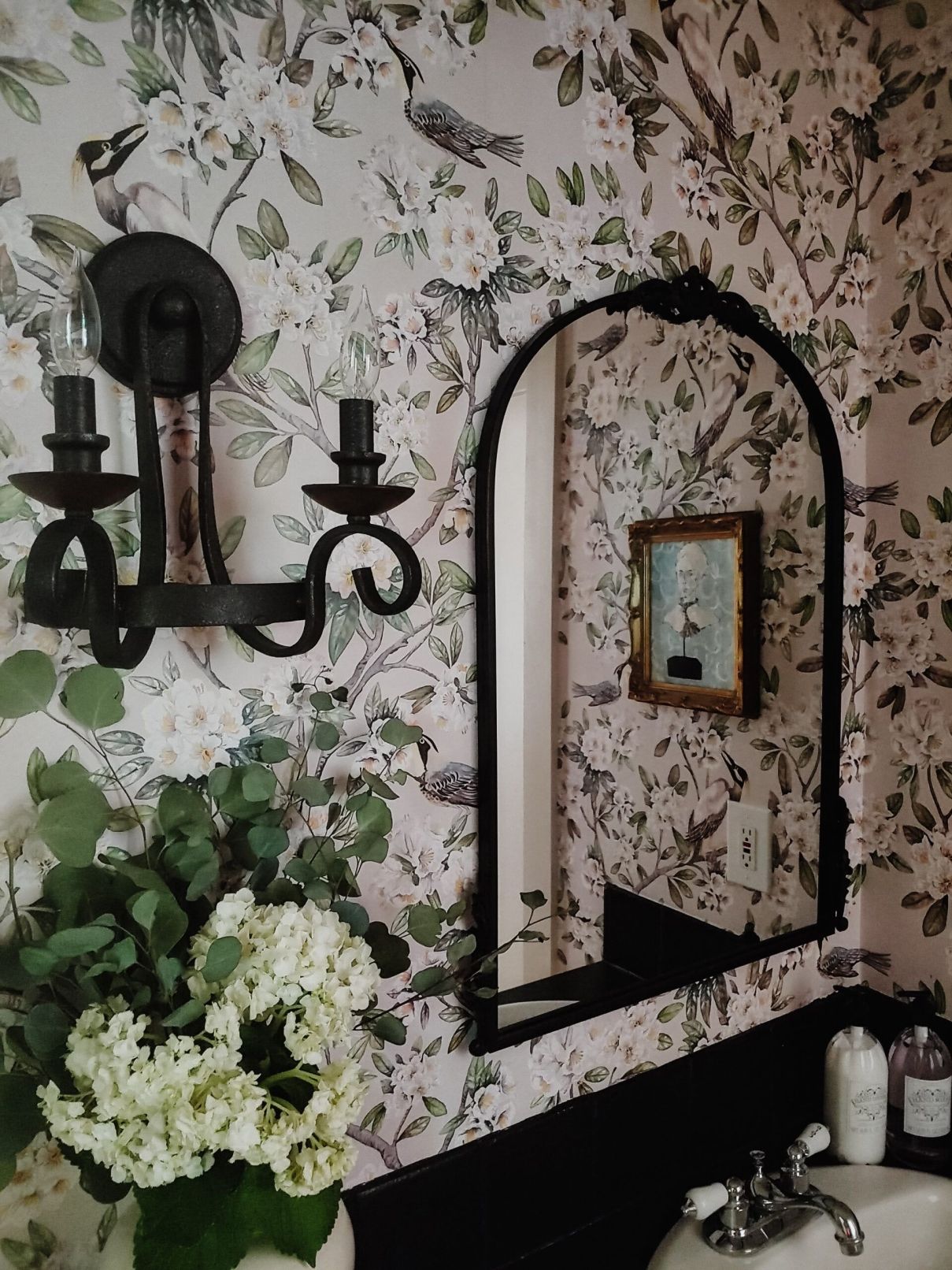 Victoria wallpaper Up Close With Black Mirror and Wall Sconce • Bathroom Wallpaper • G. Lucy Wilkening