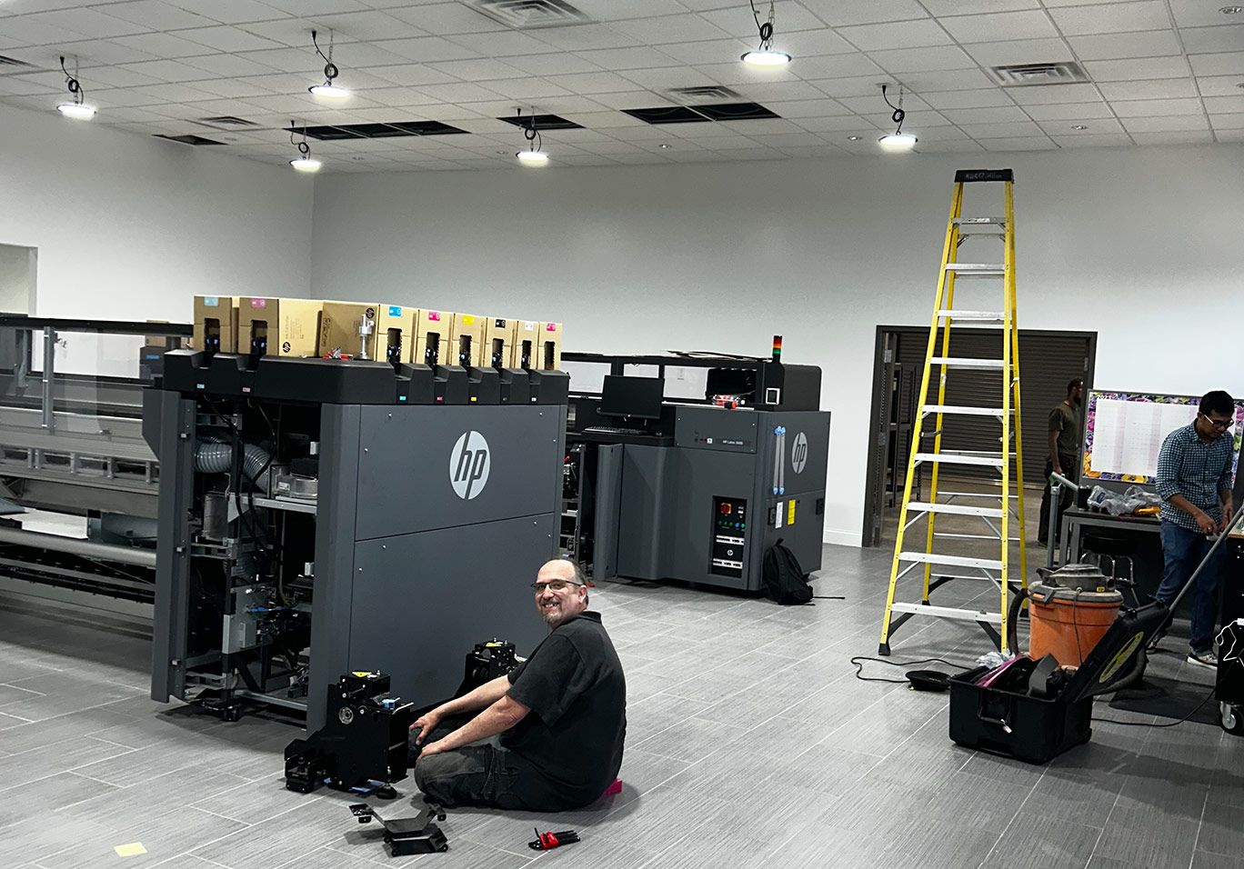 Dale the HP man working on the Dallas Printer