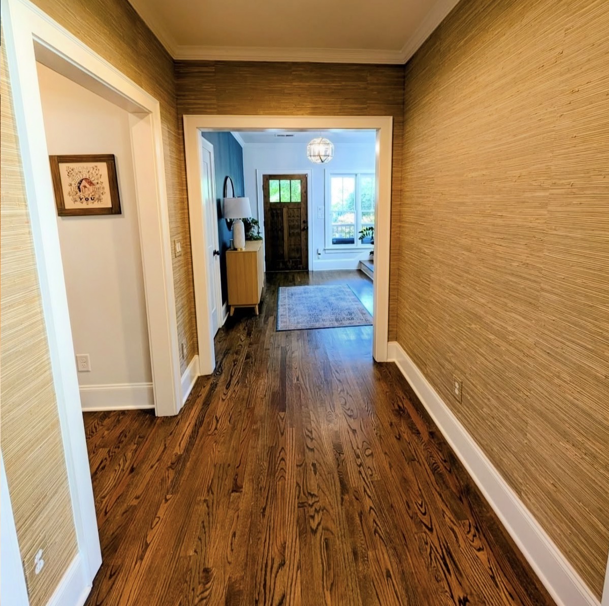 Grasscloth Wallpaper in a hallway by @homeditatl Byron B. Blake
