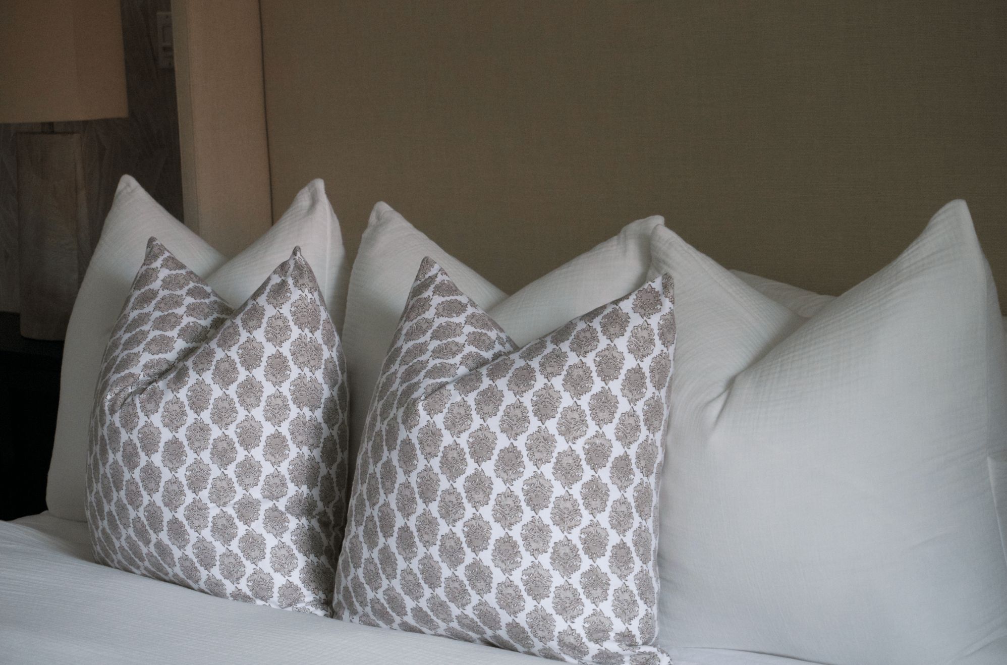 Casa Tropikana Interiors • Jamaica • Kingston 6 Dream Bedroom Makeover • Travelers Palm Wallpaper • Pillows
