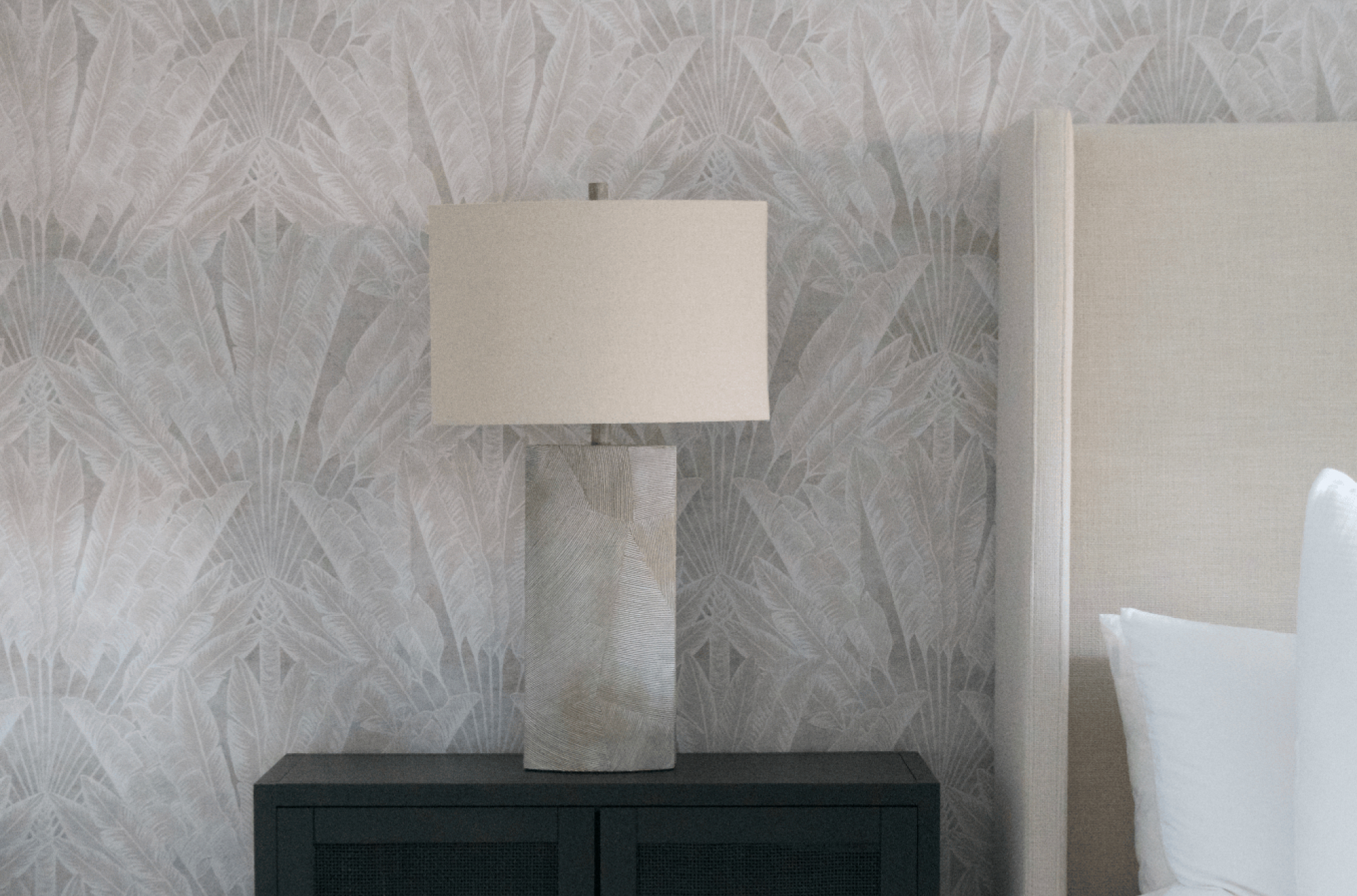 Casa Tropikana Interiors • Jamaica • Kingston 6 Dream Bedroom Makeover • Travelers Palm Wallpaper with Lamp