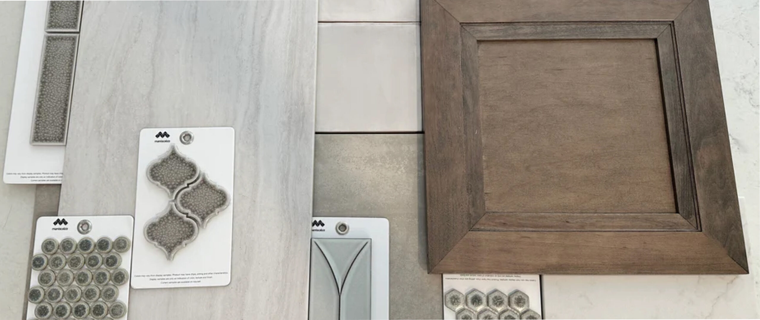 Neutral tile and wood flat lay