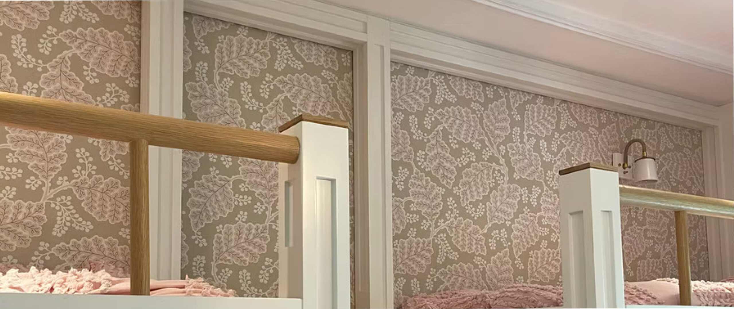 Wallpapered bunk beds in a lovely cream wallpaper