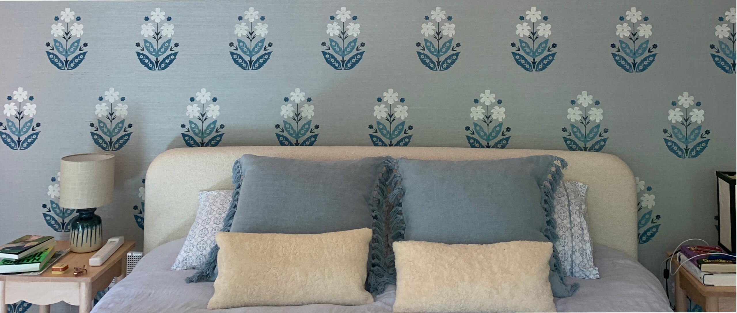 C. Crowder Painting wallpapered bedroom