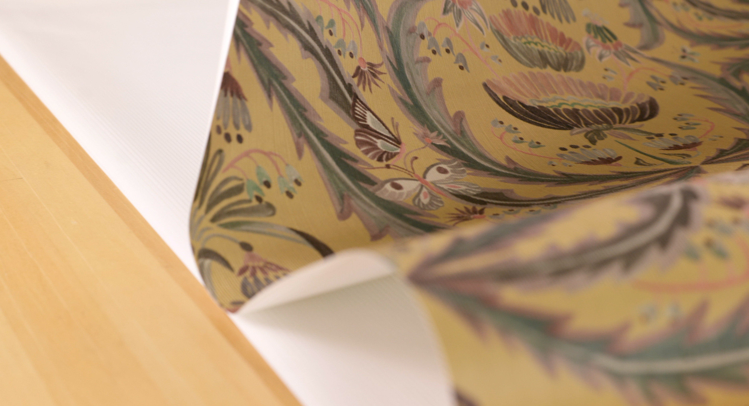 Magical Mariposa Decorative Textile Wallpaper being booked before installation